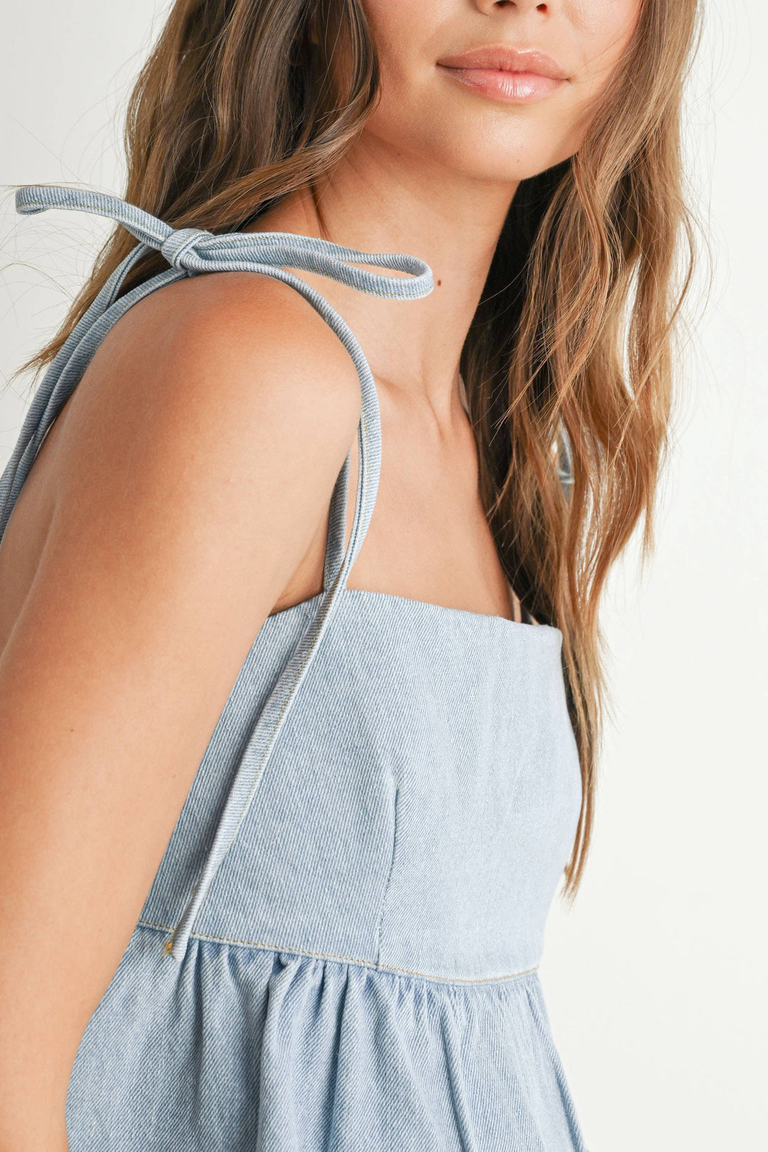 DENIM TIE STRAP PEPLUM TOP - LIGHT BLUE