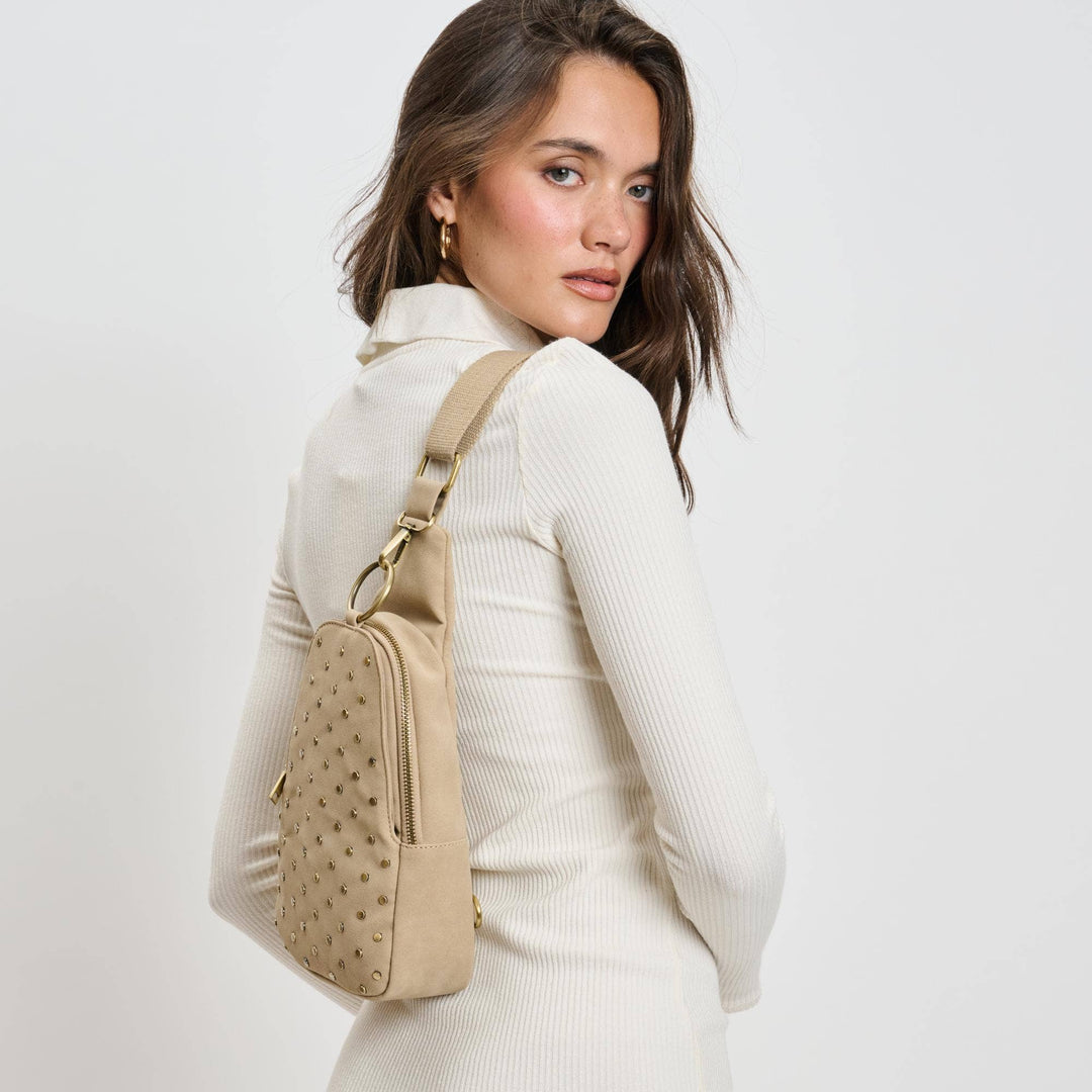 REGINA STUDDED VEGAN LEATHER SLING BACKPACK