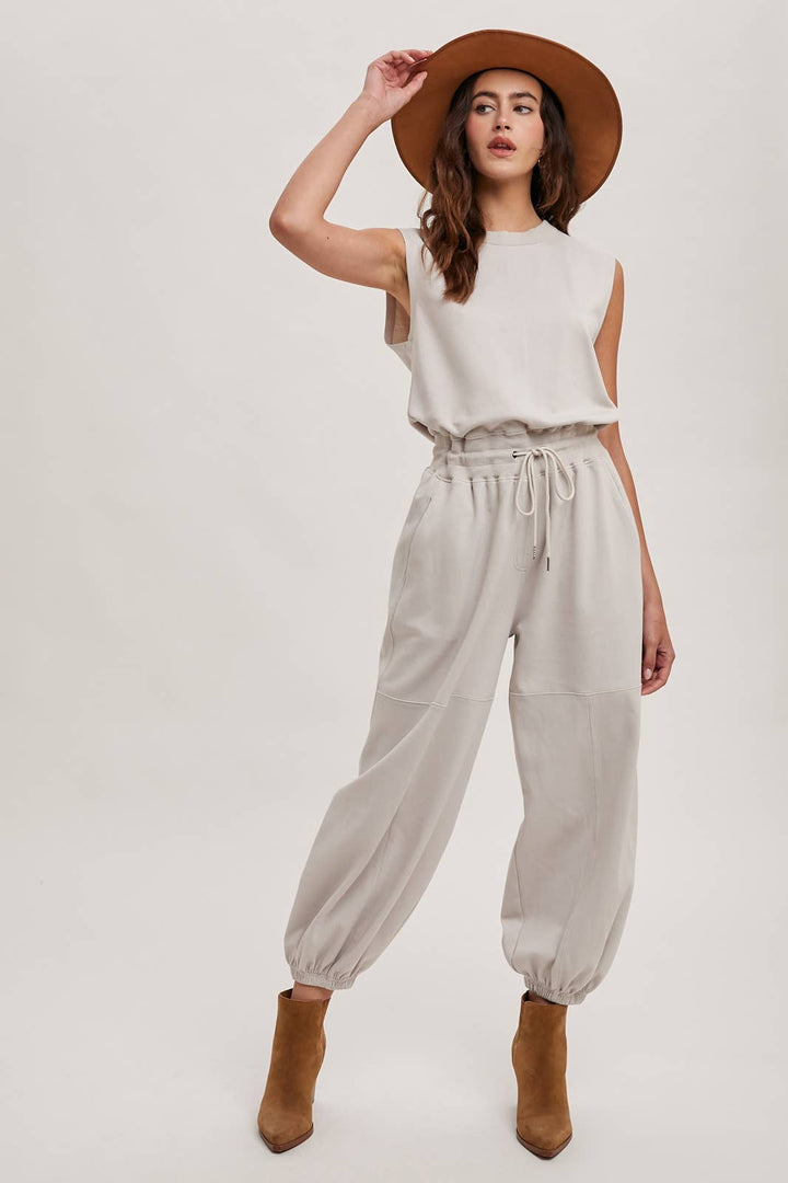 DRAWSTRING WAIST SLEEVELESS KNIT ACIVE JUMPSUIT - TAN